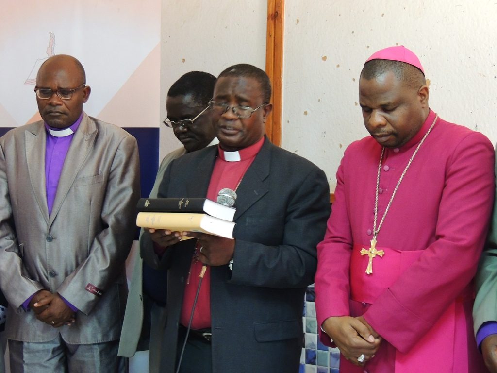Clergy dedicating the Bibles